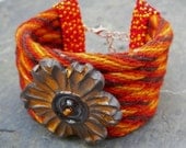 Autunno Fiore, handmade kumihimo cuff with beadwork, stoneware flower