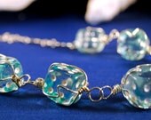 Silver Dice Necklace - Wire Wrapped Dice - Sterling silver and blue dice