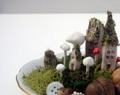 Itty bitty fairy town on a tiny saucer