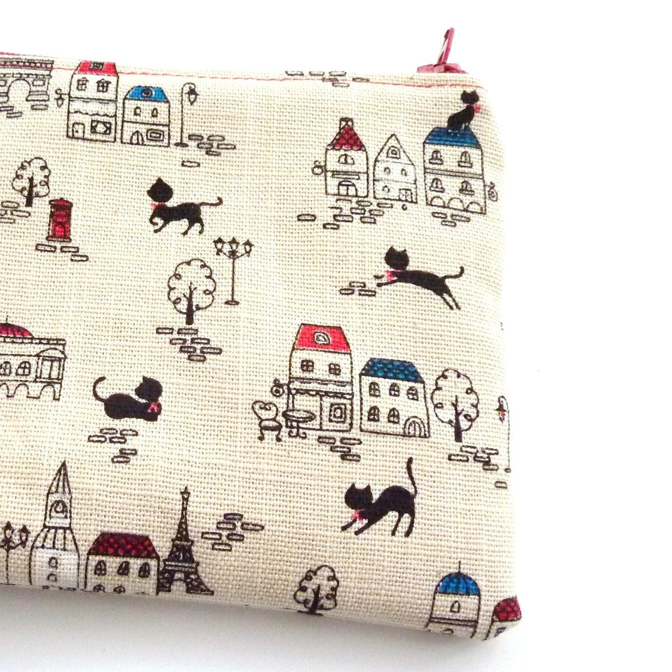 Zipped pouch in black cat print fabric