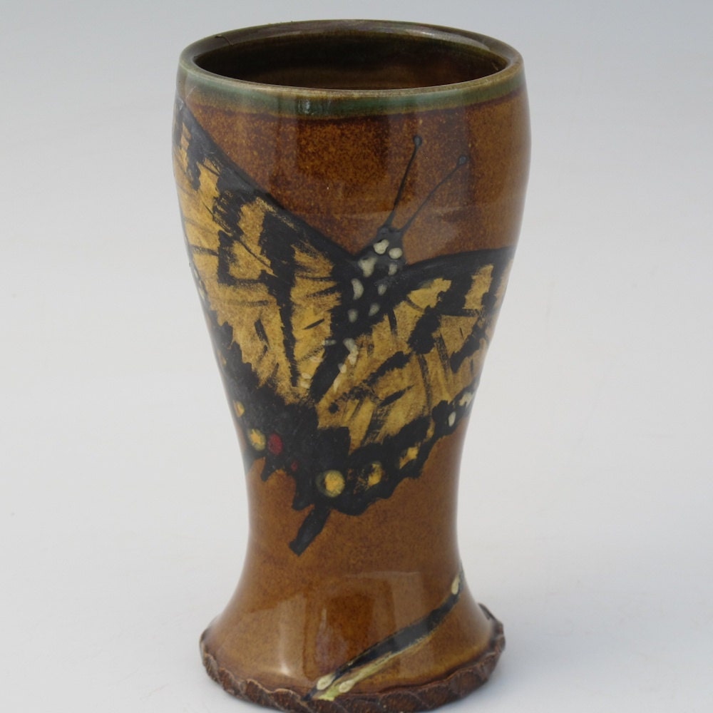 Pilsner with Tiger swallowtail butterlfy in amber