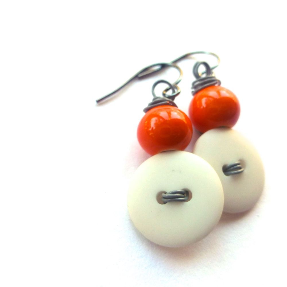 White Button Earrings with Orange Color Beads on Gray Wire