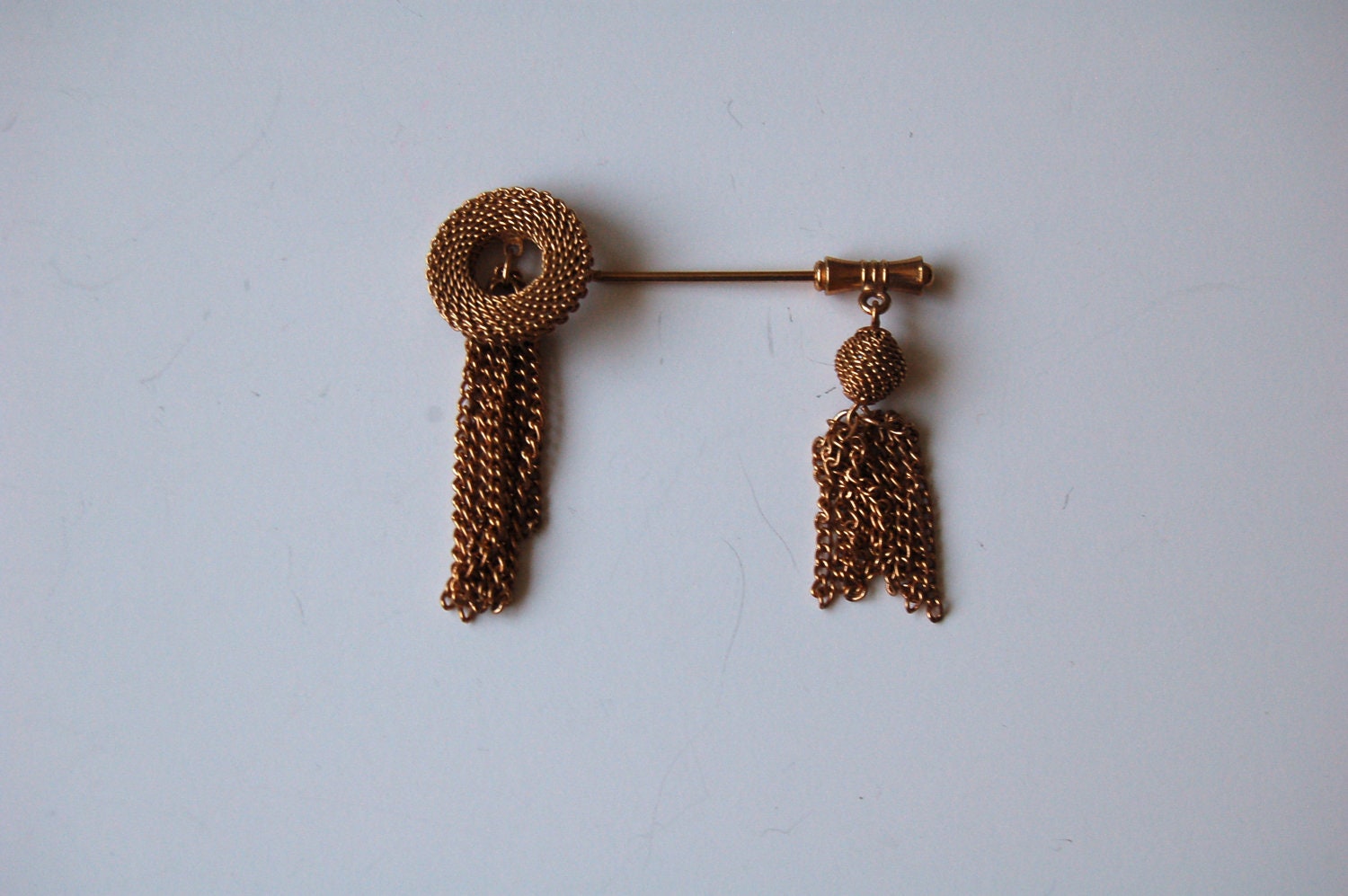 vintage EMMONS stickpin. TASSLE