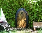 A Fairy door / Gnome door that OPENS. 12 inch rounded Gnome / Fairy door with lion knock.