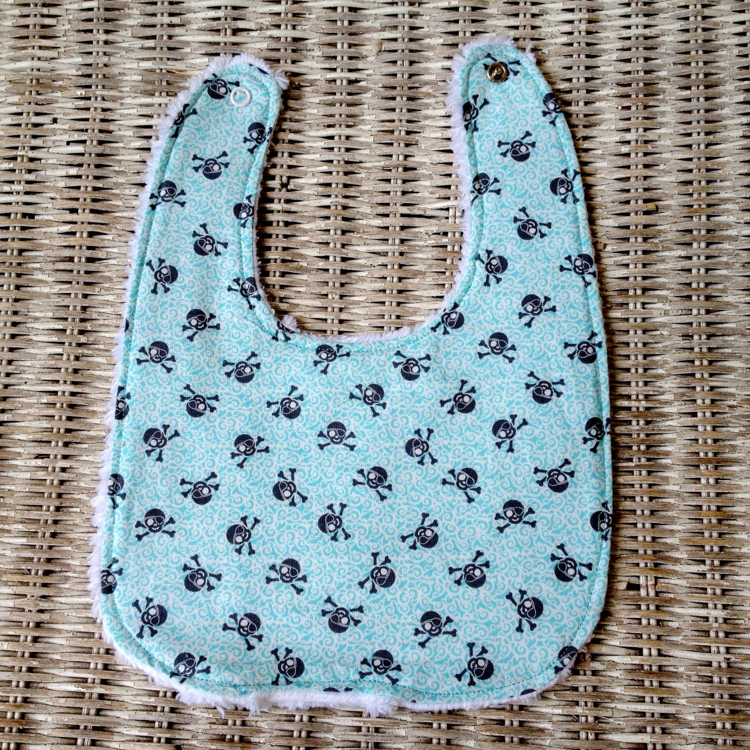 Turquoise and Grey Skull and Crossbones Chenille Bib