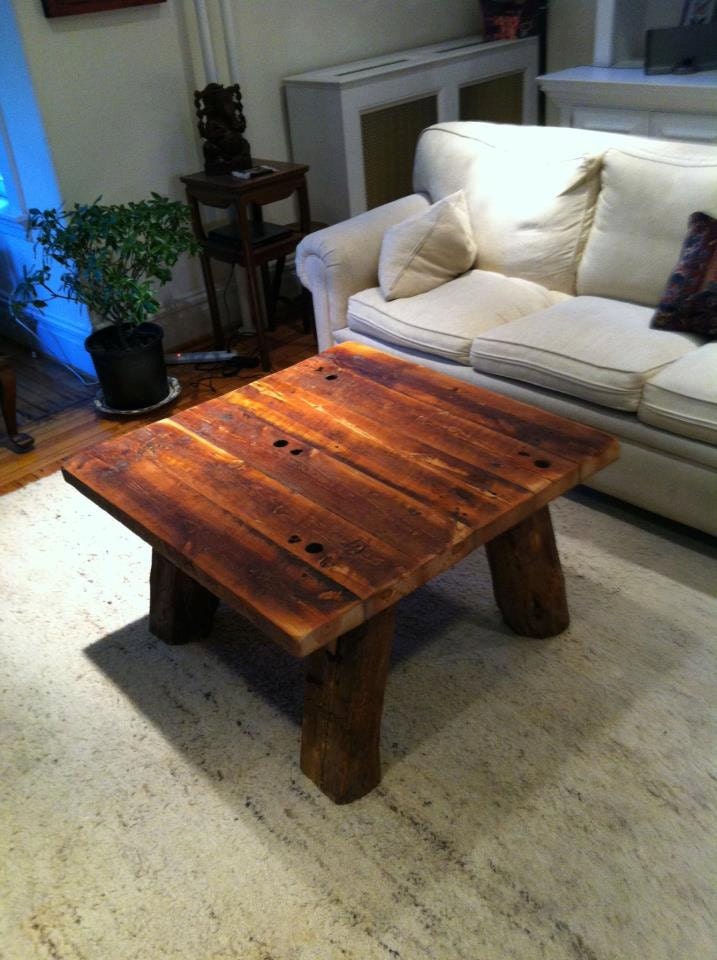 Heart pine rustic coffee table with hand hewn legs