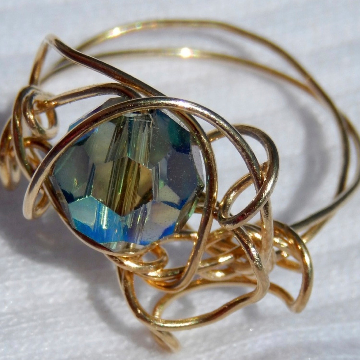 MELITA. AB yellow green blue crystal glass and solid brass wire wrapped ring. size 9