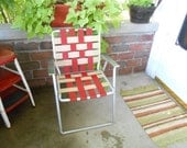 Vintage lawn chair webbed