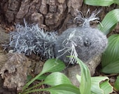 knitted, felted grey squirrel plush with acorn
