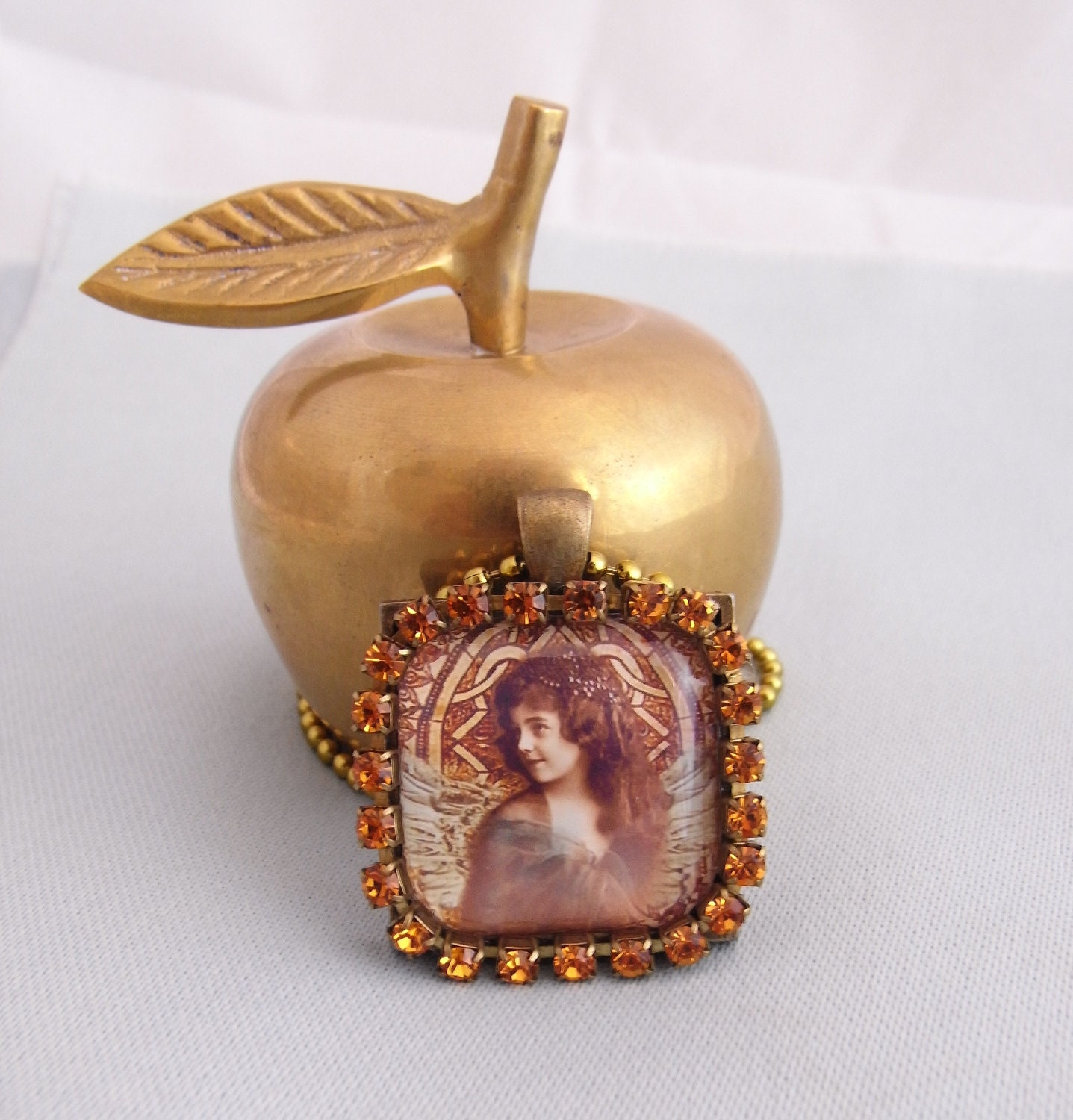 winged girl vintage ephemera art pendant, sepia tones, topaz rhinestone deluxe, Ageless Beauty