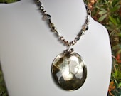 MOP shell necklace, pearl silver pyrite and black lip round shell pendant