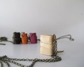 Pale brown mini book necklace