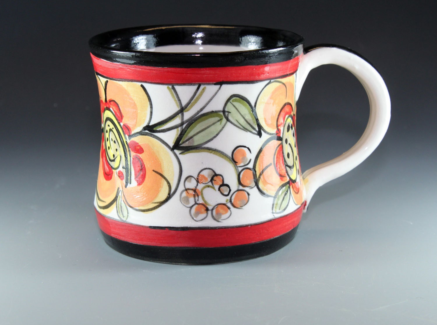 Majolica style black and red rimmed coffee mug