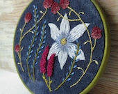 Wild Garden - Hand Embroidered Floral Wall Hanging in Blues, Pinks and Plums