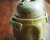 Small Green Frosted Container with White Interior