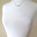 Silver geometric necklace with silver faceted beads, sterling plated, minimalist and modern