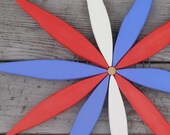 Outdoor Wooden Starburst Wreath (red white & blue)