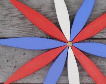 Outdoor Wooden Starburst Wreath (red white & blue)