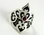 Victorian scrollwork princess ring in synthetic ruby and sterling silver with black patina