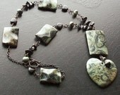 Kambaba jasper on blackened brass with blackstone -Artists Sky-Green, black, dark blue