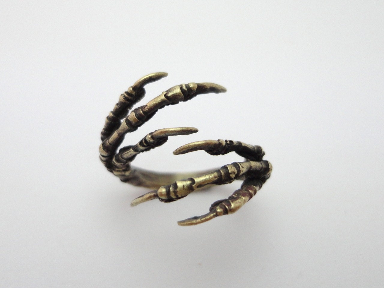 Double Claw Starling Ring in Brass