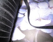 1/2" width black Satin elastic has one side shine for undergarment and headband