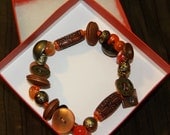 Button bracelet, brass, charm, copper,orange, earth tone, wooden beads