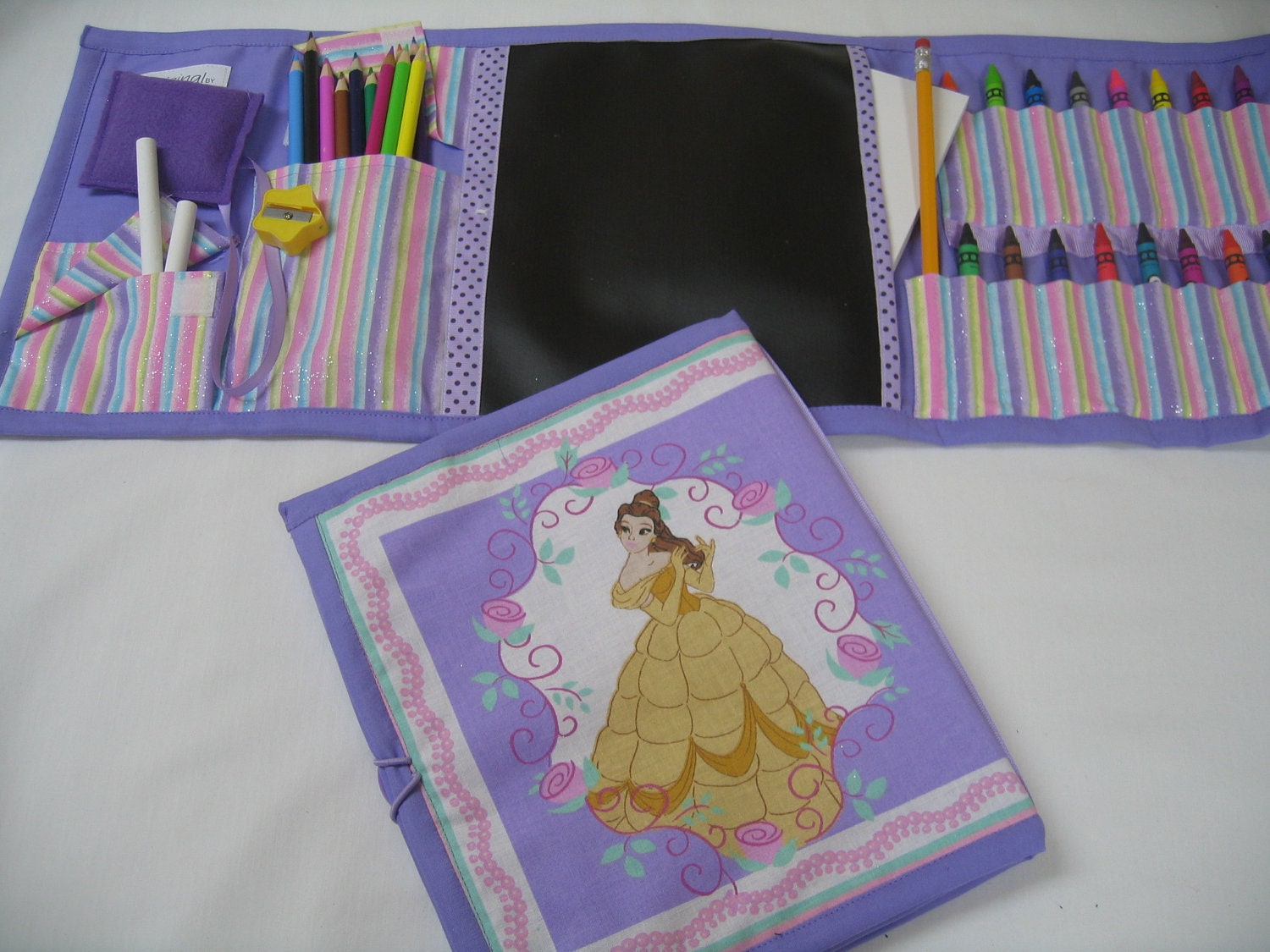 Princess Belle Art Tote in a colorful print complete with chalk, eraser, chalkboard, colored pencils, pencil, sharpener, crayons, and paper