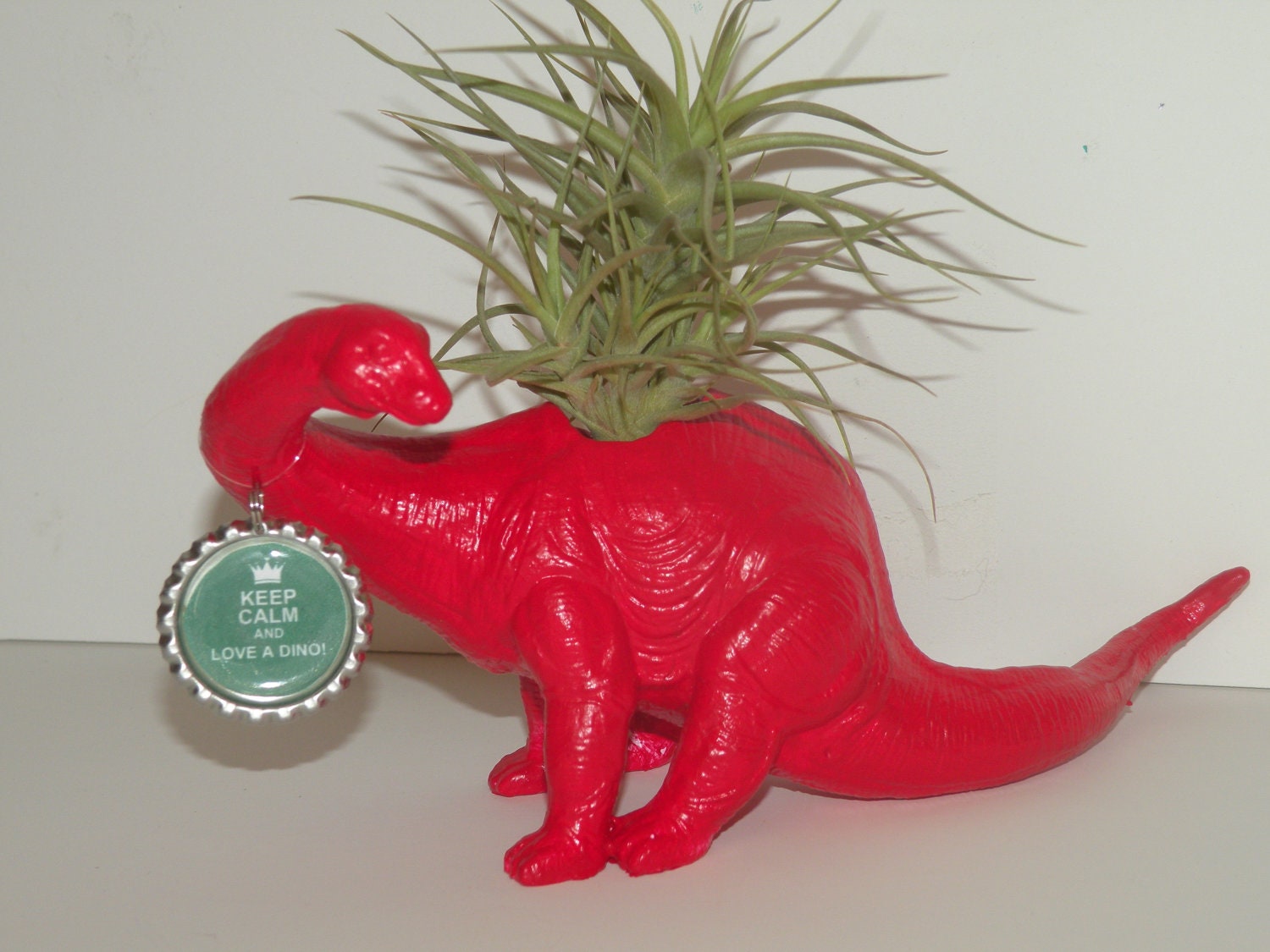 Keep Calm and Love a Dino. Dinosaur planter with air plant.