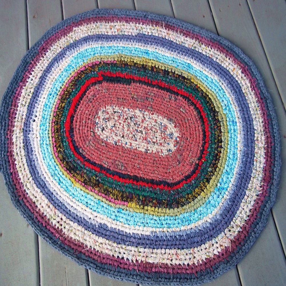 29 by 37 inch oval crocheted rag rug