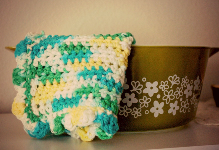 phoebe, a funky multi-colored crocheted scallop-edge pot holder, heat pad, dish cloth