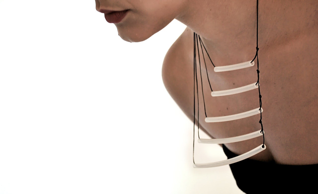 Geometric statement necklace- minimal assymetric industrial- network-plastic tube-lines gradual- under 50