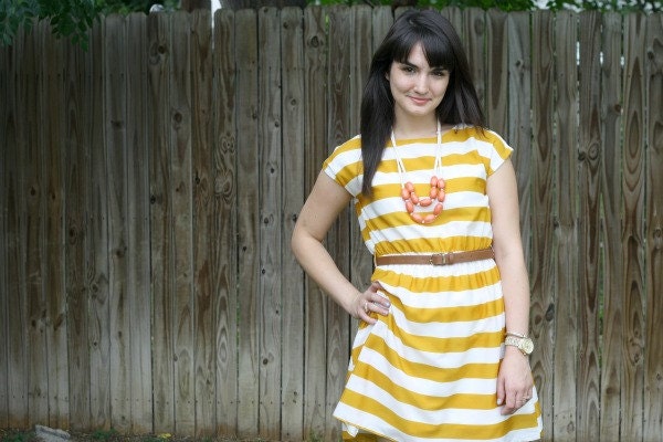 coral wooden bib necklace with cream cotton jersey
