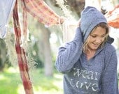 wear Love  put it on. wear it out.  medium v neck long sleeve pullover hoodie in eco-navy.