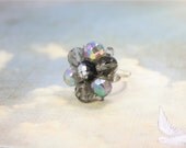 Ring repurposed vintage. Silver tone and adjustable.  Beautiful and one of a kind.