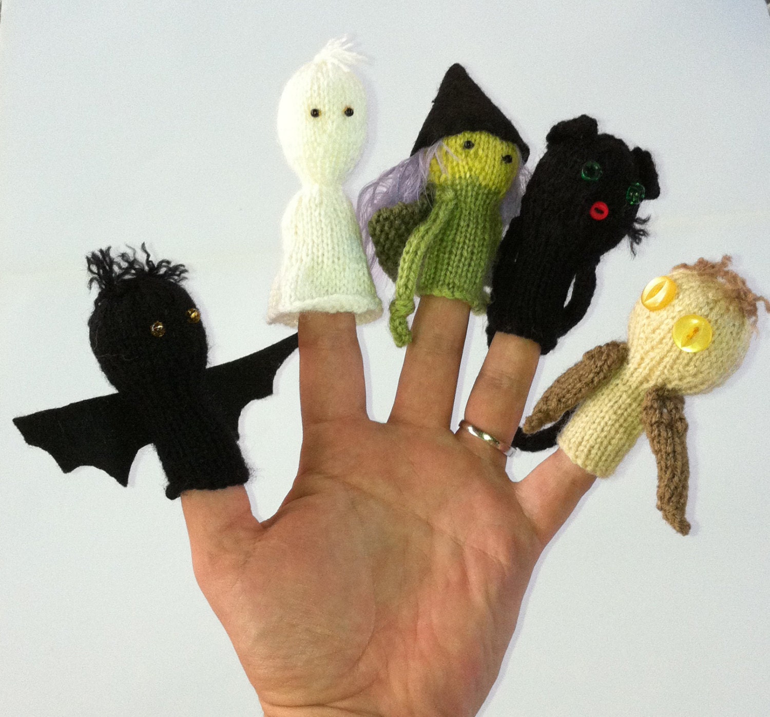 Halloween finger puppets: ghost, witch, black cat, owl and bat.