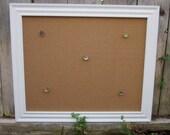 White framed cork board