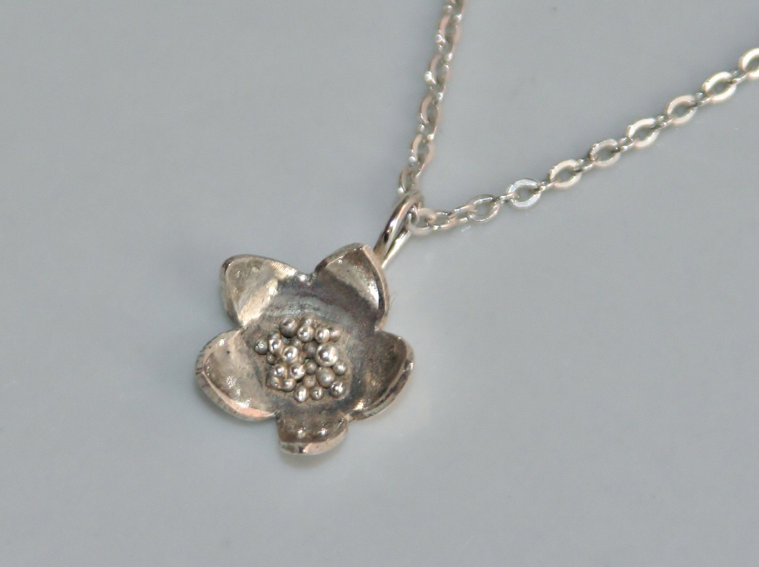 Small Flower Pendant in Sterling Silver