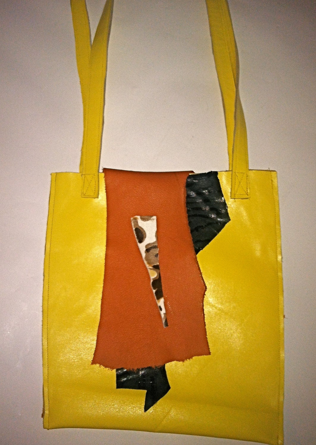 Sunburst  yellow and multi color leather pocket boook