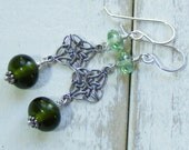 Handmade lampwork earrings made with recycled Pagan wine bottle lampwork beads, sterling silver and Czech glass