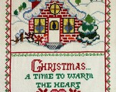 Completed cross stitch - Christmas Cottage