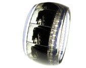 resin bracelet filmstrip bangle . hot rod . vintage 35mm film . made from a strip of film from Grease 1978 . John Travolta