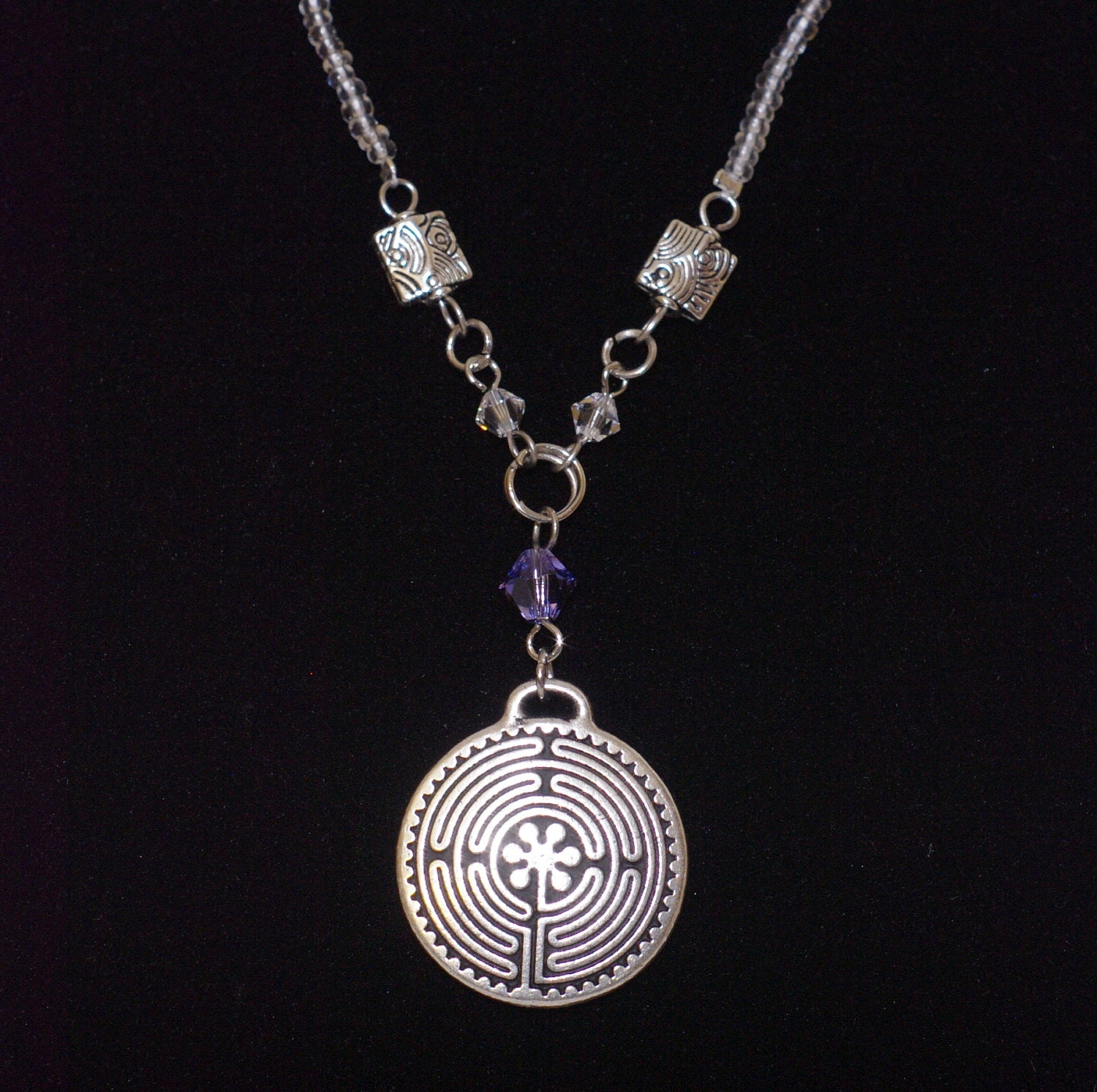 Silver pendant necklace with purple Swarovski Crystals