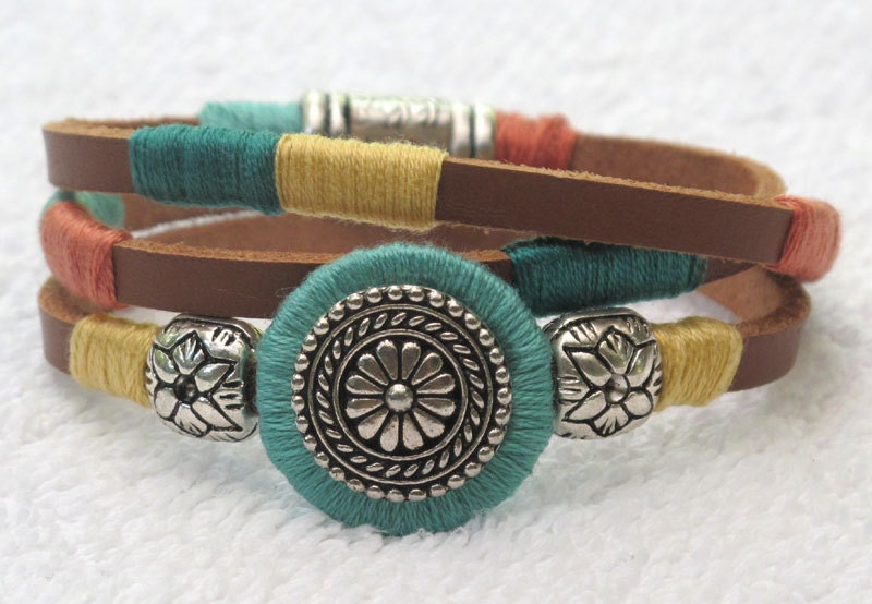 Leather hand-coiled Whirly Wrap bracelet in southwest colors with silver accents