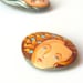 Painted stone.  painted pebble. painting on stone.
