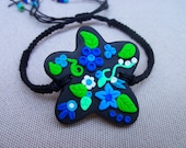 Hemp and Polymer Clay Bracelet, black focal pendant with blue flowers