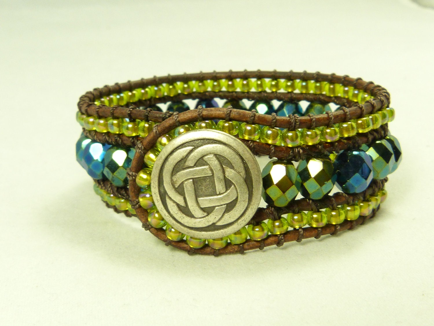 Beaded cuff bracelet -  Green, Celitic knot - Iridescent green, peridot.