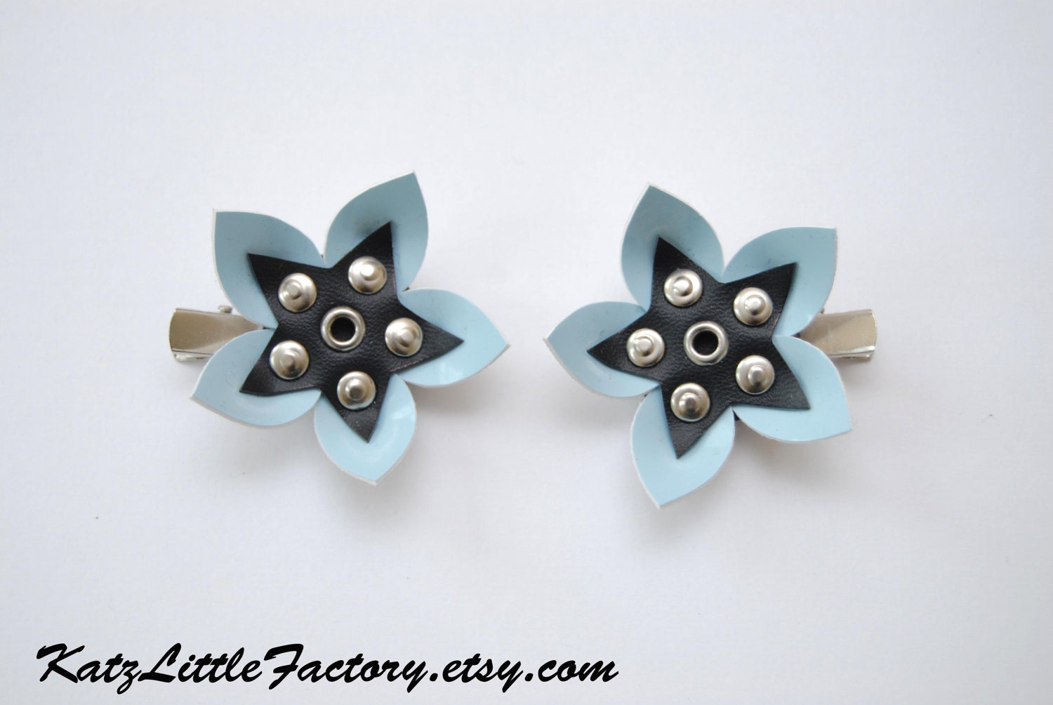 Pair baby blue and black PVC Cyber Flowers gothic industrial studded hair clips