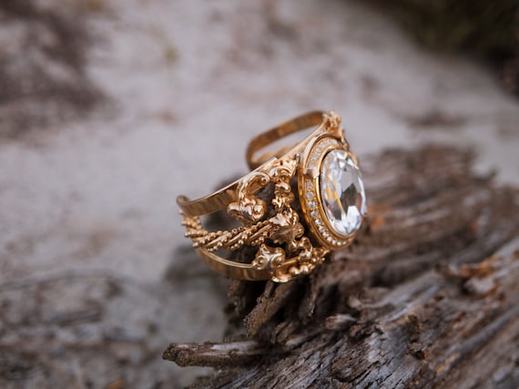 Vintage cuff with large stone and gold detailing