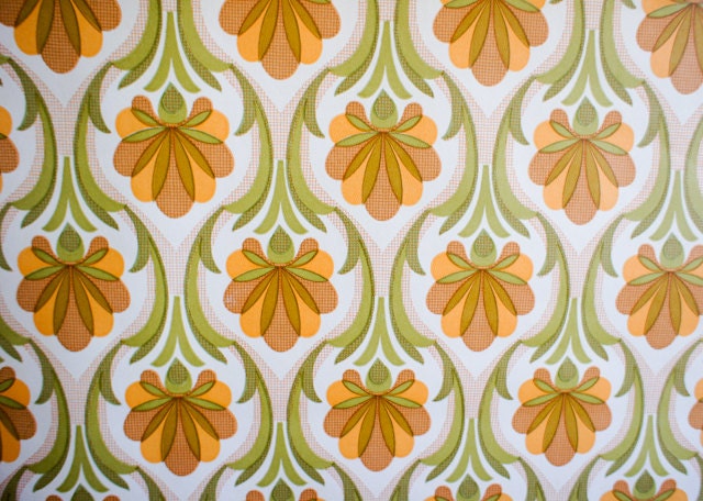 1970's french wallpaper with geometric flower design in greens, browns and orange, full roll